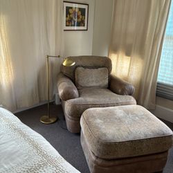 High End Custom Swivel Chair With Ottoman. 