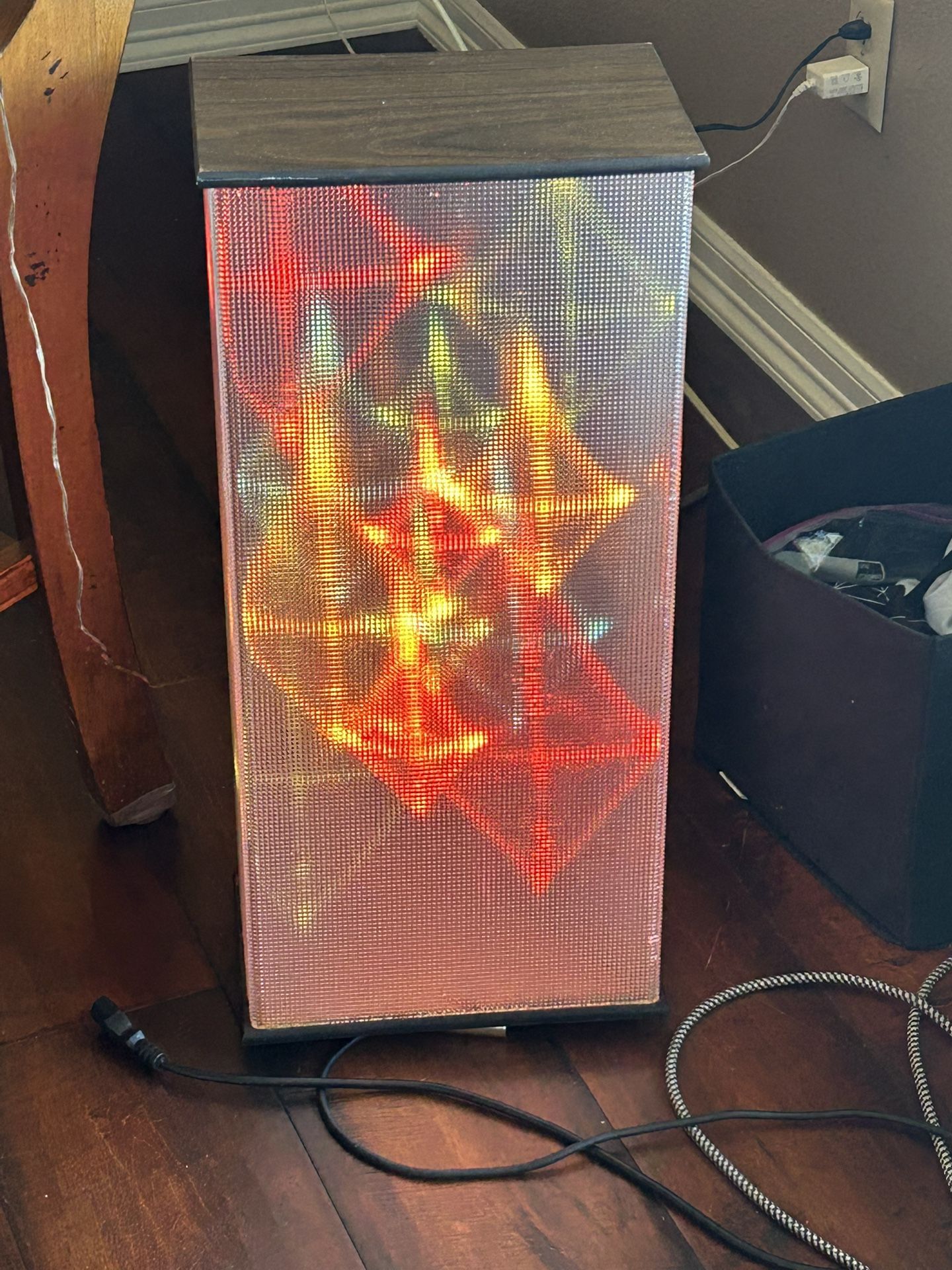 Two vintage color, light boxes that tie into your speakers where you put the speaker wires in and flash to the music. Could’ve been made by RadioShack