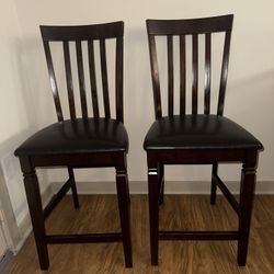 4 Pub Style tall dinning chair Seats Dark Wood Leather PU Cushioned. Will sell separately. 