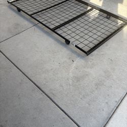 Roll-out twin metal bed frame