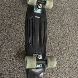 Penny Board - 22” Black W/ Green Wheels