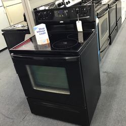 Whirlpool 4 burner Glass Top Range. 1 year Warranty 