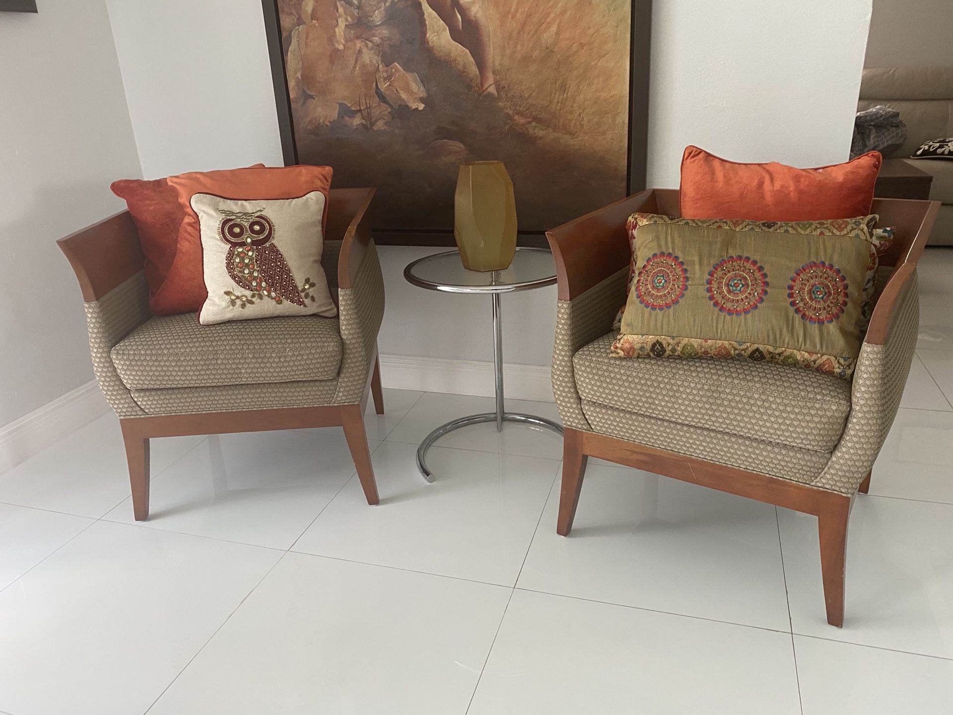 Designer wooden and fabric chairs. 2 of them. Sold separately or as a pair.