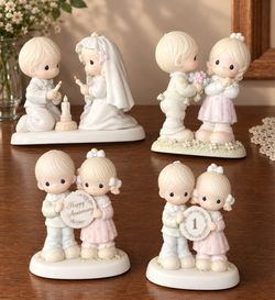 Precious Moments Anniversary Figurine Set of 4