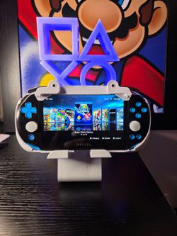 Aqua Blue, white and black PS Vita 2000