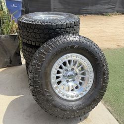 4 kmc rims 35x12.50r17 TOYO AT tires Tacoma rims Chevy rims 6 lug rims 35s llantas r17 methods