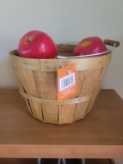 Basket with artificial apples
