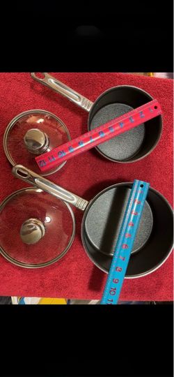 CA.  2 T-FAL ARMARAL POTS/PANS. HEAVY DUTY.