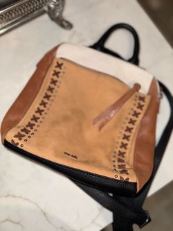 The Sak Multi-Color Leather Backpack Purse with two large pockets