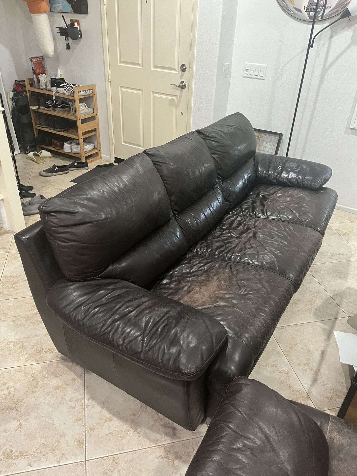 Leather couch and loveseat set