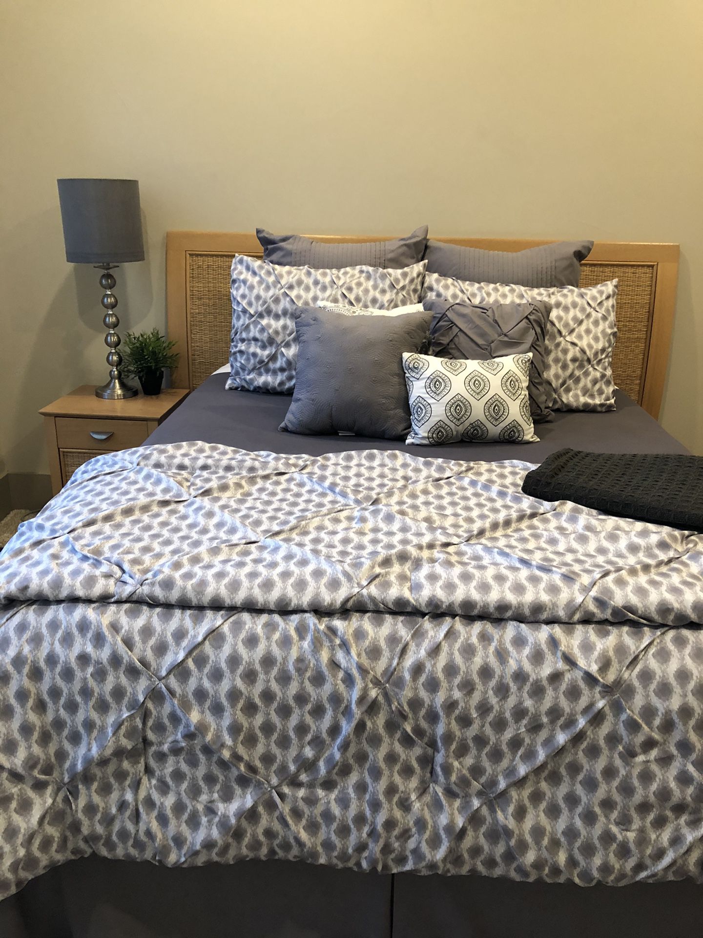 King headboard with 2 matching night stands. And matching Armoire for a TV or clothes/storage.Armoire has been used both ways. Armoire dimensions are