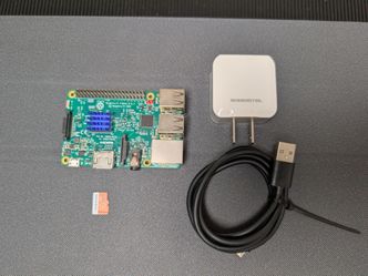 Raspberry Pi 3B with MicroSD memory card and USB power supply and
