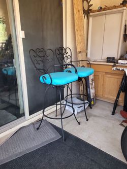 Wrought Iron Bar Stools with Turquoise Cushions