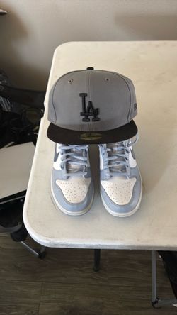 NEW ERA HAT SIZE 7 and NIKES DUNKS SIZE 5.5y