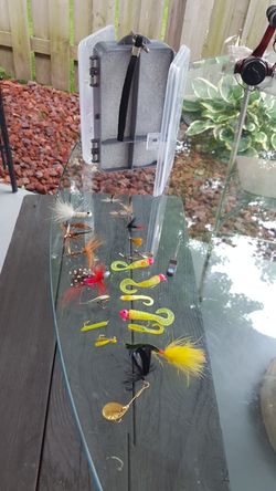 20. FLY. FISHING lures and carry case