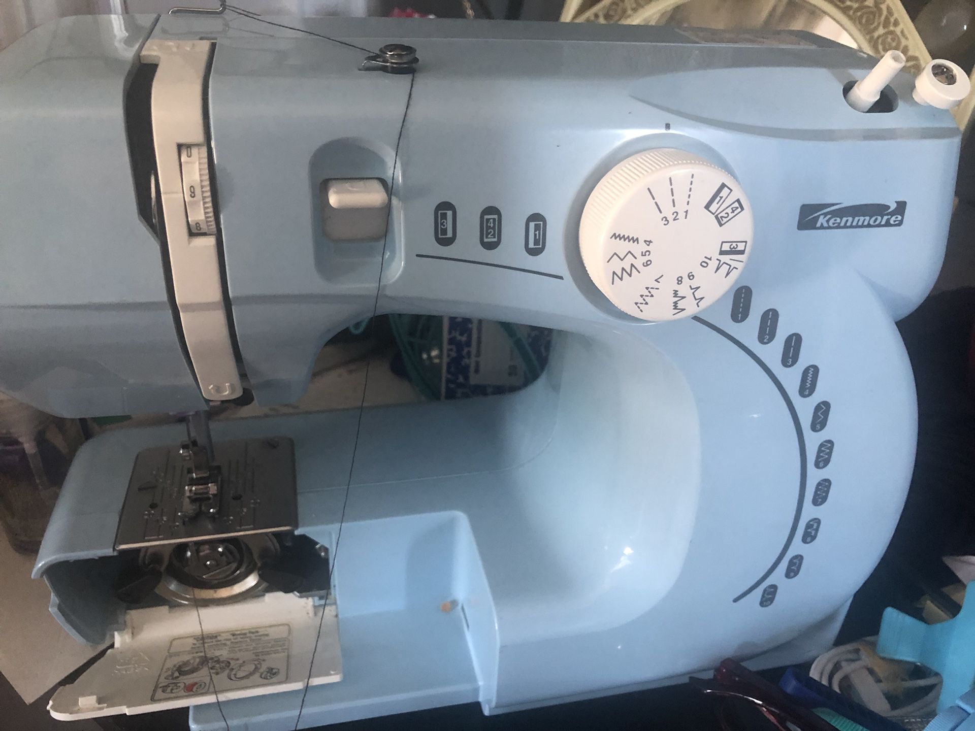 Sewing machine Kenmore. Not picking up the bottom thread other than that works.