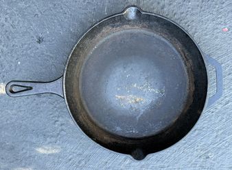 Cuisinel cast iron skillet, 12” top diameter, 9-3/4” bottom diameter and 2-1/4” deep.