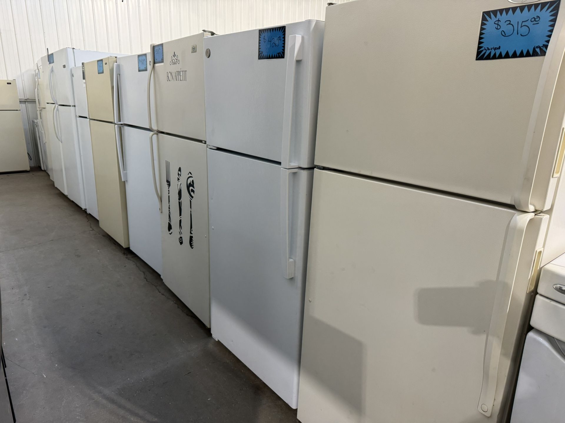 Several Clean Refrigerators