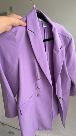 purple coat with brown long sleeve shirt