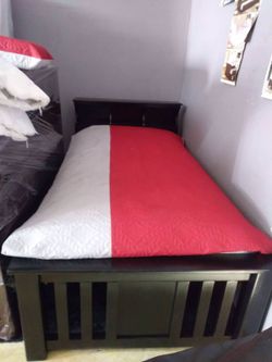 Twin wooden bed