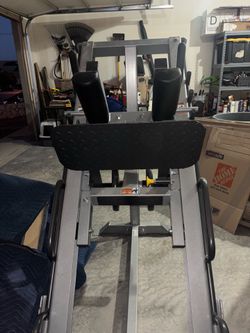 Hoist leg press and hack combo machine