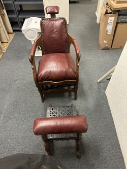 Antique Vintage Barber Chair With Separate Foot Stool. Leather And Heavy Wrought Iron