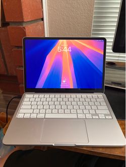 Apple book MacBook Neo 512 Touch ID silver