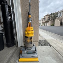 Dyson Upright Vacuum Cleaners with Rotating Brushes