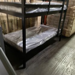 Twin bunk bed. Comes in espresso, white & grey. Assembly required. Assembly not included. Taxes included. Free delivery.  Bunk bed only-$220 Bunk bed 