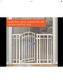 Baby or pets gate 48 inches wide adjustable 36 inches high it’s new in box