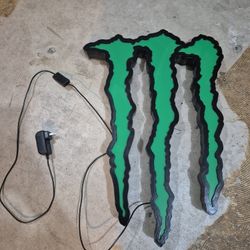 neon lighted energy monster sign