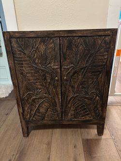 Dark brown decorative cabinet