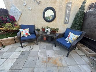 Two Chairs And A Table