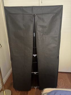 Fabric wardrobe closet with rods and shelves black
