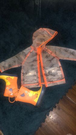 Adorable toddler raincoat and rubber boots