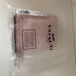 New powder pink Coach wallet