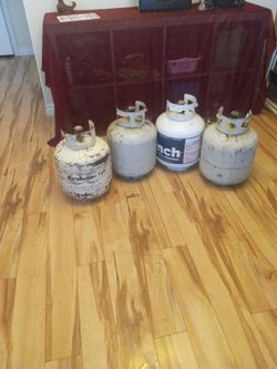 LP Tanks. 3 Empty. 1 Full