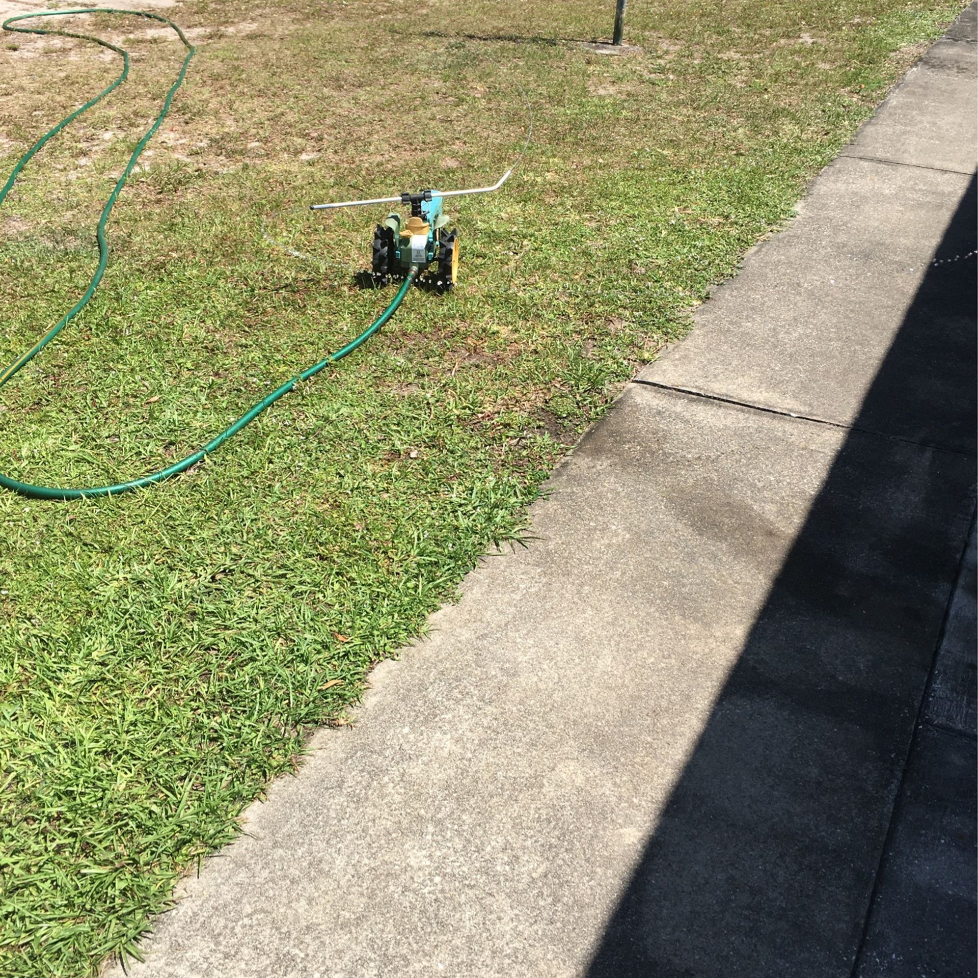 John Deere water sprinkler
