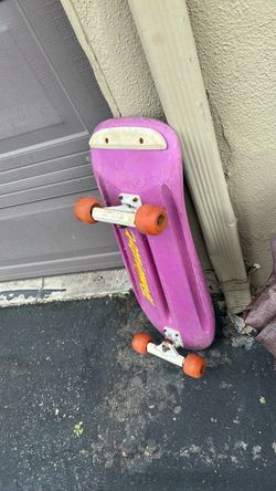 Plastic purple skateboard