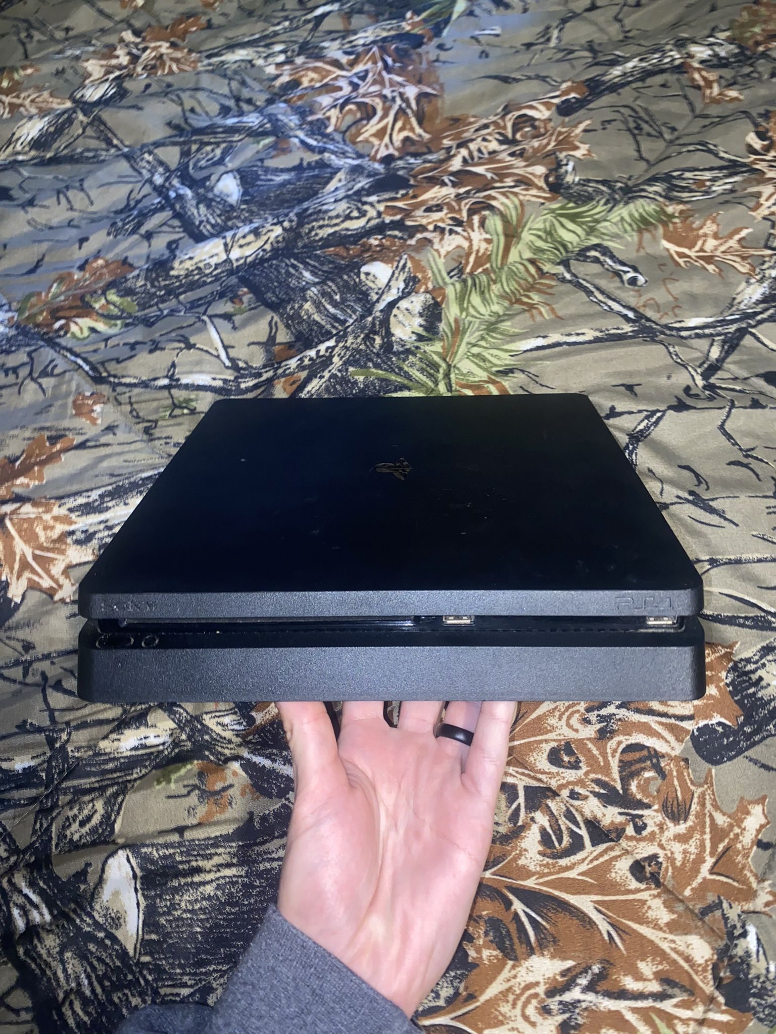 PS4 Slim , All Black , Comes With 2 Controllers ,games Already Downloaded On It