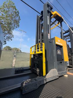 Stand up reach forklift