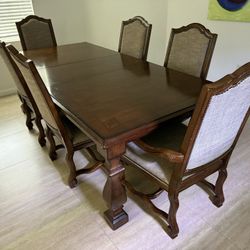 Fancy Dinning Table With Two Leaflets And Six Chairs