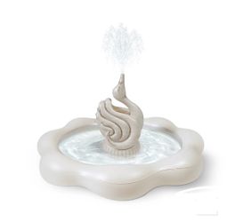 THE COASTAL TRAVERTINE SWAN FOUNTAIN SPRINKLER