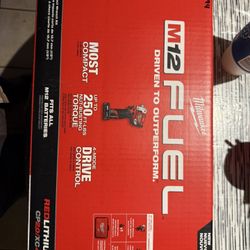 Milwaukee m12v 1/2” stubby with 2 batts, charger , tool bag new in box $275 in n Lakeland 