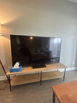 Wooden TV console with metal legs