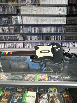 Guitar Hero Guitar Ps2 Wired  $90  Gamehogs 11am-8pm