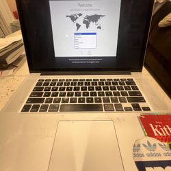 MacBook Pro $200 (willing to negotiate)