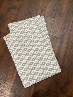 Gray and white blanket