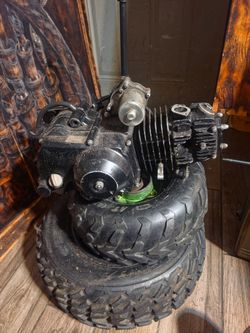 125 ho. Auto forward and reverse with hand shifter