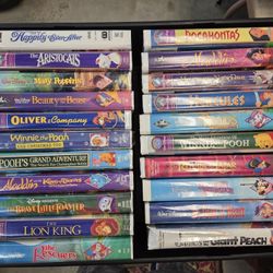 Collection of Disney movies some have never been opened Vhs.